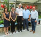 Left, Alyson Haywood and right Mike Lind, with staff from Squires Garden Centre, Hersham.